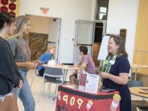 Katie Wohlman interacts with students